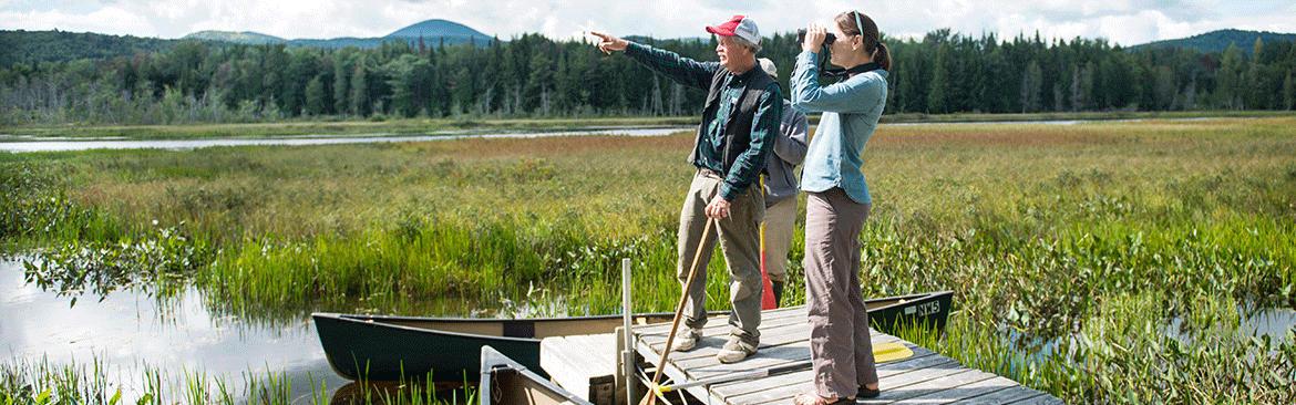 two people on a dock overlooking the Clyde River