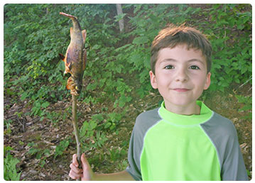 young angler with his roasted perch