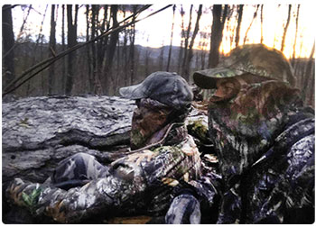 Shawn Goode with son turkey hunting