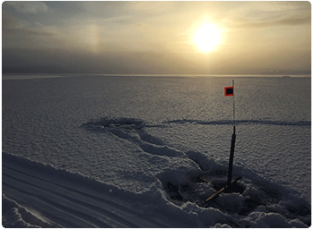 sunrise and ice fishing