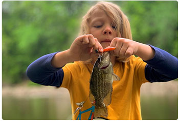 young angler with a panfish