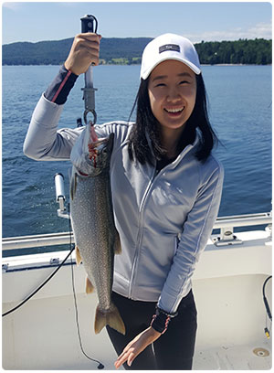 Young girl with a lake trout