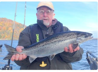 Karl Hubbard with a salmon