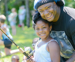 man and daughter fishing