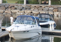two motor boats at a dock