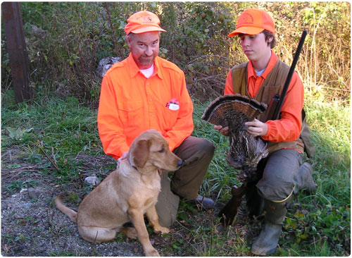 father and son with turkey