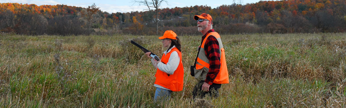 Two hunters in the field